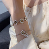ANENJERY Fashion Retro Daisy Flower Bracelet Silver Color Link Chain Adjustale Bracelet Gift Party Jewelry for Women Men S-B410