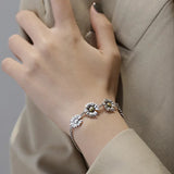 ANENJERY Fashion Retro Daisy Flower Bracelet Silver Color Link Chain Adjustale Bracelet Gift Party Jewelry for Women Men S-B410