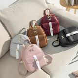 Ladies New Fashion Metal Bowknot Decorated Zipper PU Compact Backpack Go Out Portable Change Mobile Wallet Storage